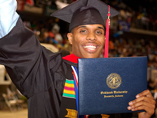 Oakwood University student graduating
