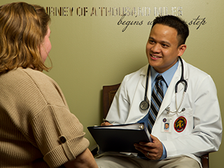 Union College physician's assistant student with patient